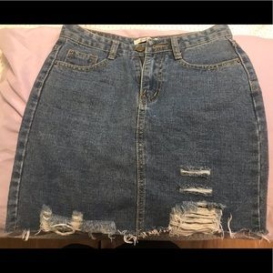 Distressed jean skirt